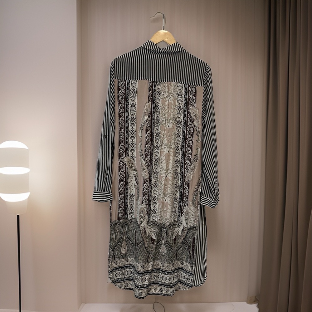 Beautiful, sheer and flowy dress or coverup.
